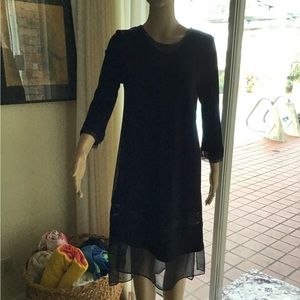 Sexy black dress, size medium/small lined with semi sheer side panels